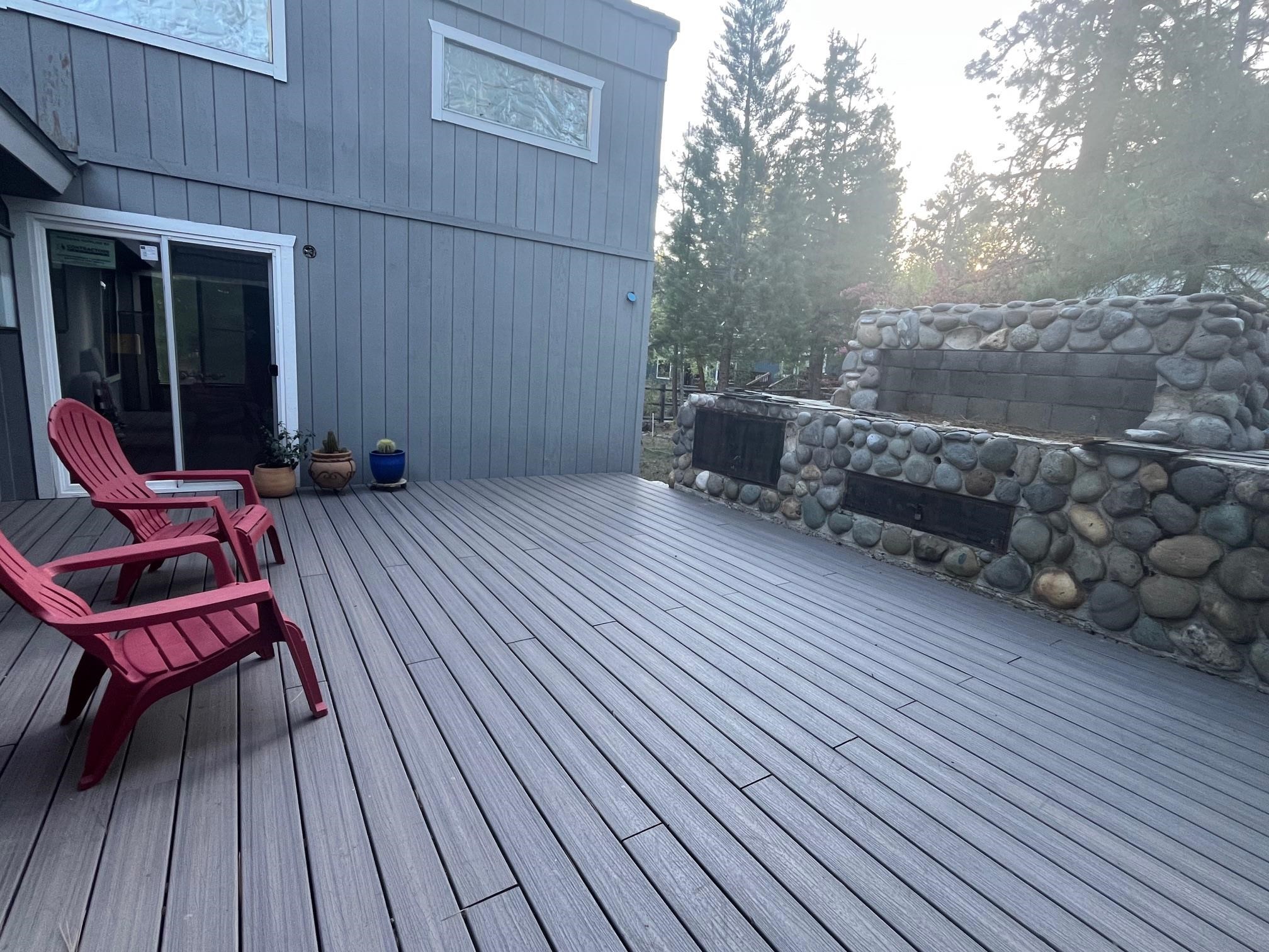 14567 Royal Way Truckee, CA 96161 - Photo 8 of 8 a backyard of a house with wooden floor and outdoor seating