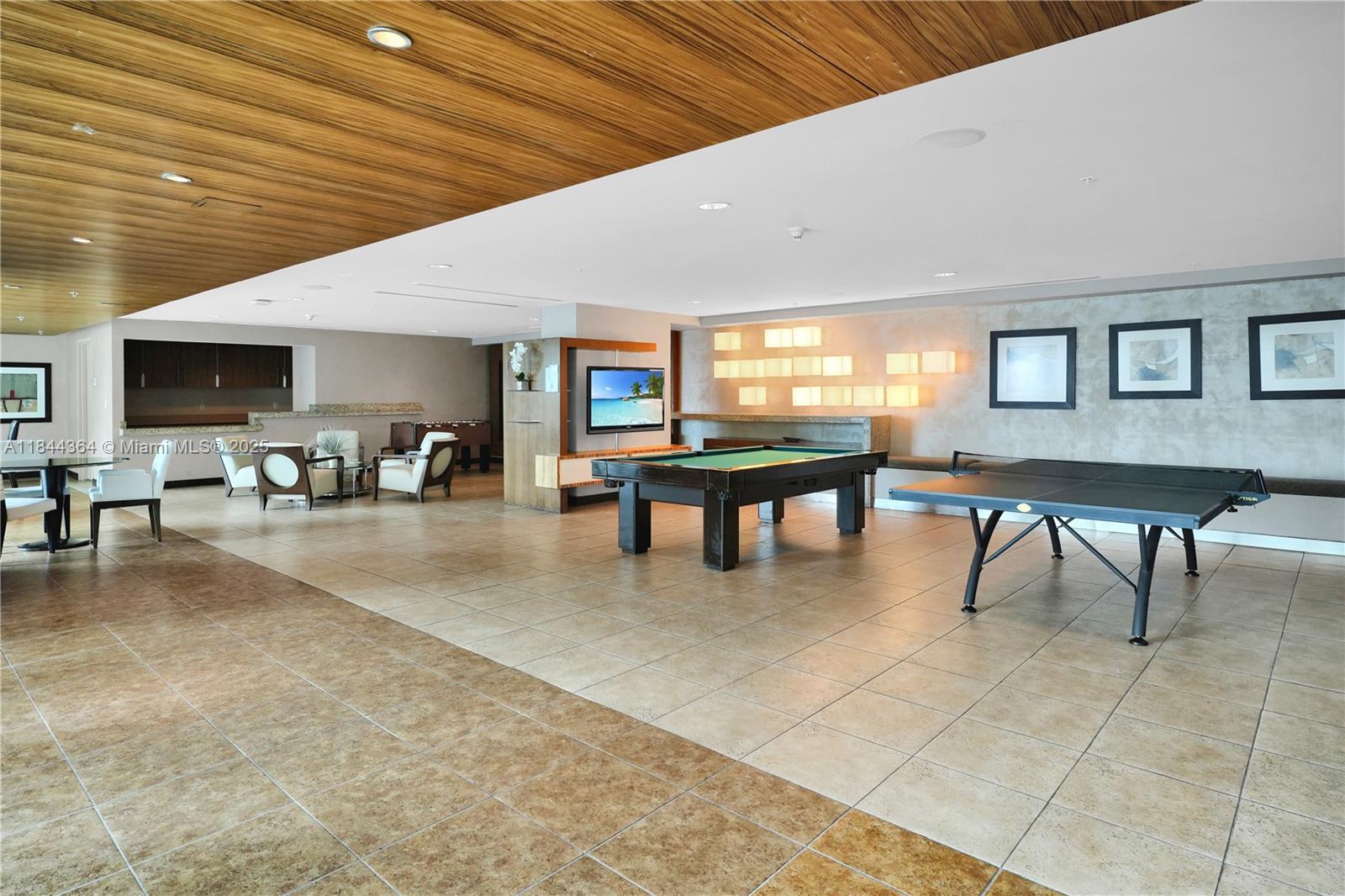 60 Southwest 13th Street, Unit 4411 Miami, FL 33130 - Photo 21 of 38 a livingroom with furniture and a large window