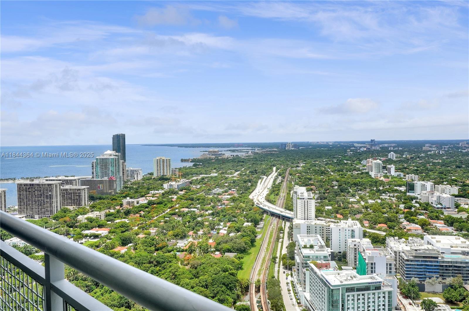 60 Southwest 13th Street, Unit 4411 Miami, FL 33130 - Photo 32 of 38 a view of a city from a balcony
