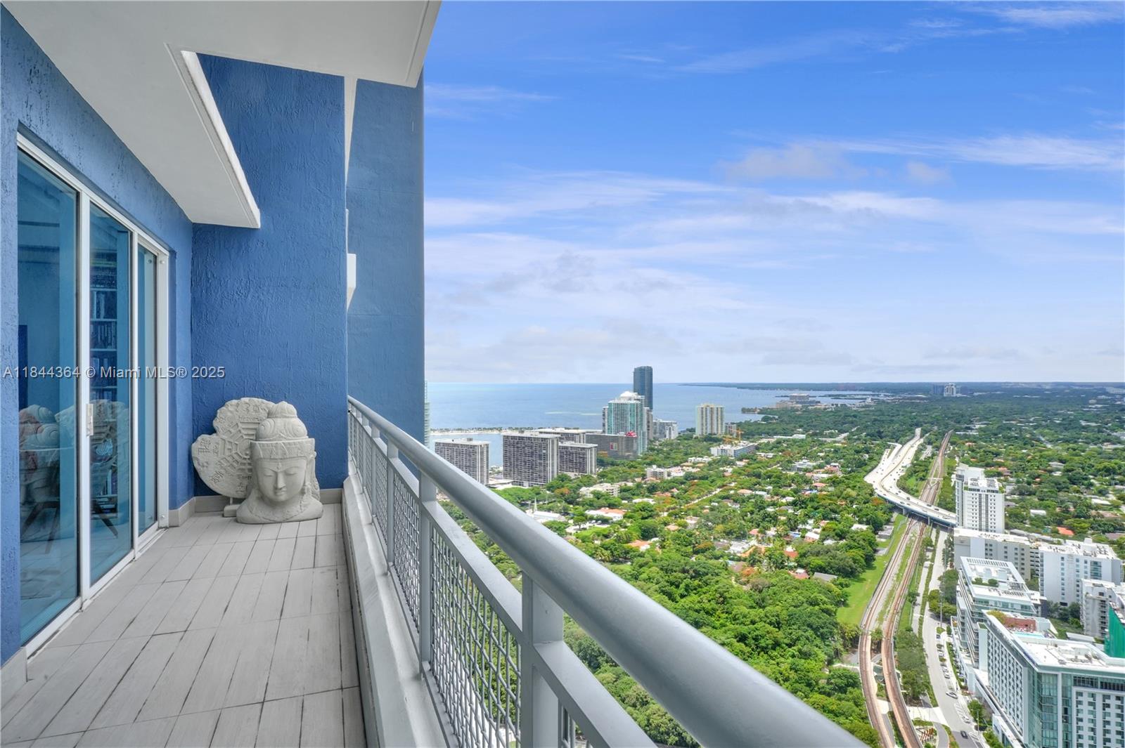 60 Southwest 13th Street, Unit 4411 Miami, FL 33130 - Photo 33 of 38 a view of balcony with furniture