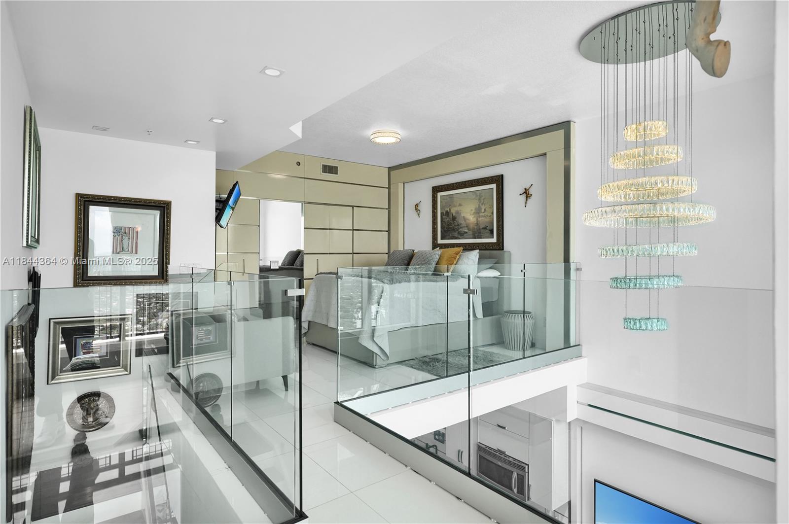 60 Southwest 13th Street, Unit 4411 Miami, FL 33130 - Photo 10 of 38 a view of a living room and dining room