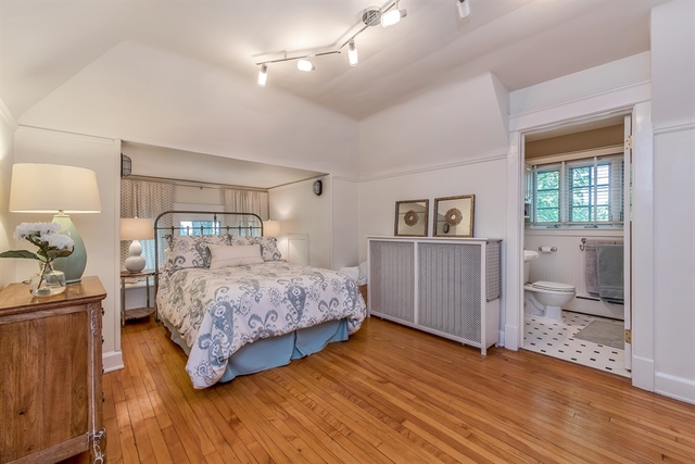 72 Abbotsford Road Winnetka, IL 60093 - Photo 14 of 29 a bedroom with a bed and wooden floor