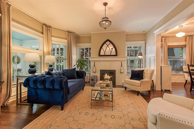 72 Abbotsford Road Winnetka, IL 60093 - Photo 4 of 29 a living room with furniture and a fireplace