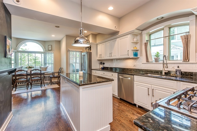 72 Abbotsford Road Winnetka, IL 60093 - Photo 6 of 29 a kitchen with stainless steel appliances granite countertop sink stove top oven and cabinets