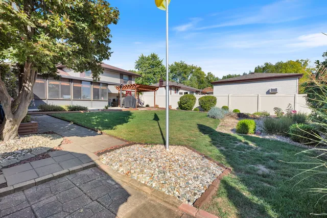 a house view with a garden space