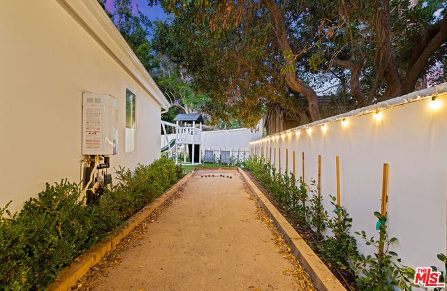 a view of a garden with pathway