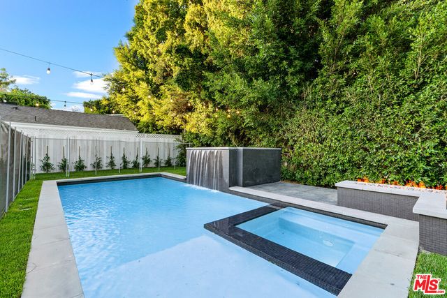 a view of a house with a swimming pool