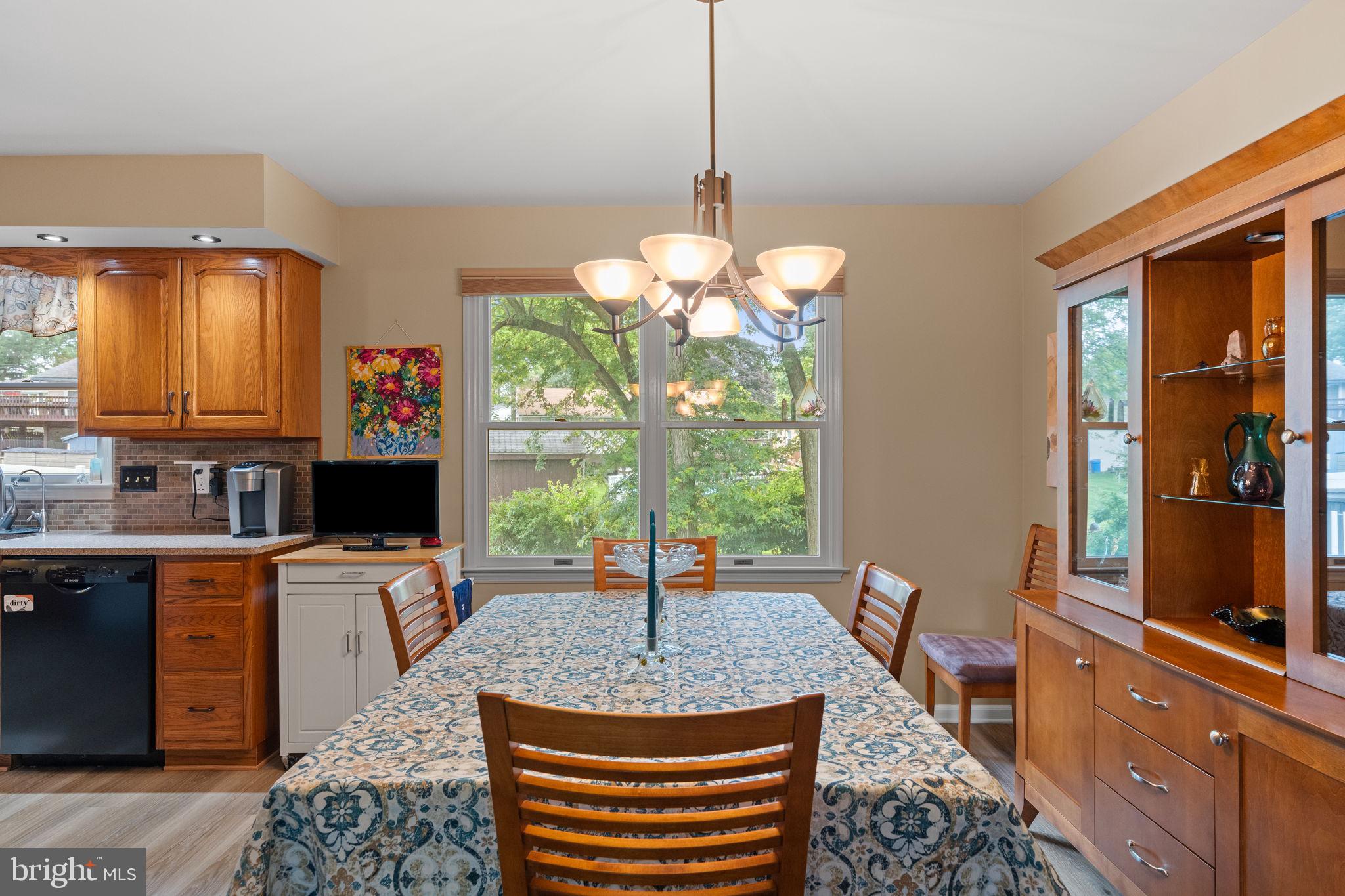 1036 Boeshore Circle Reading, PA 19605 - Photo 11 of 52 a kitchen with a chandelier appliances and cabinets