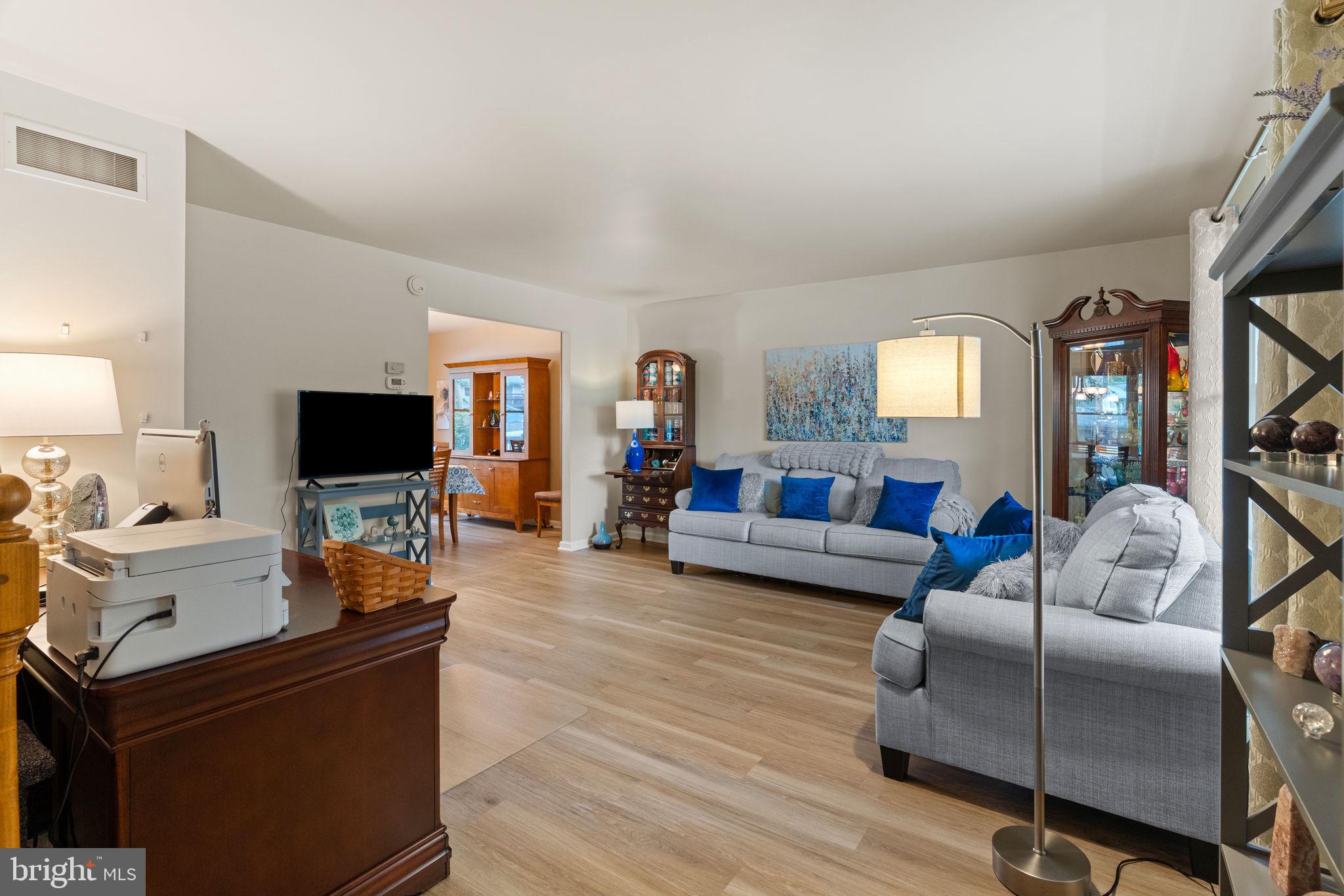 1036 Boeshore Circle Reading, PA 19605 - Photo 5 of 52 a living room with furniture and a flat screen tv