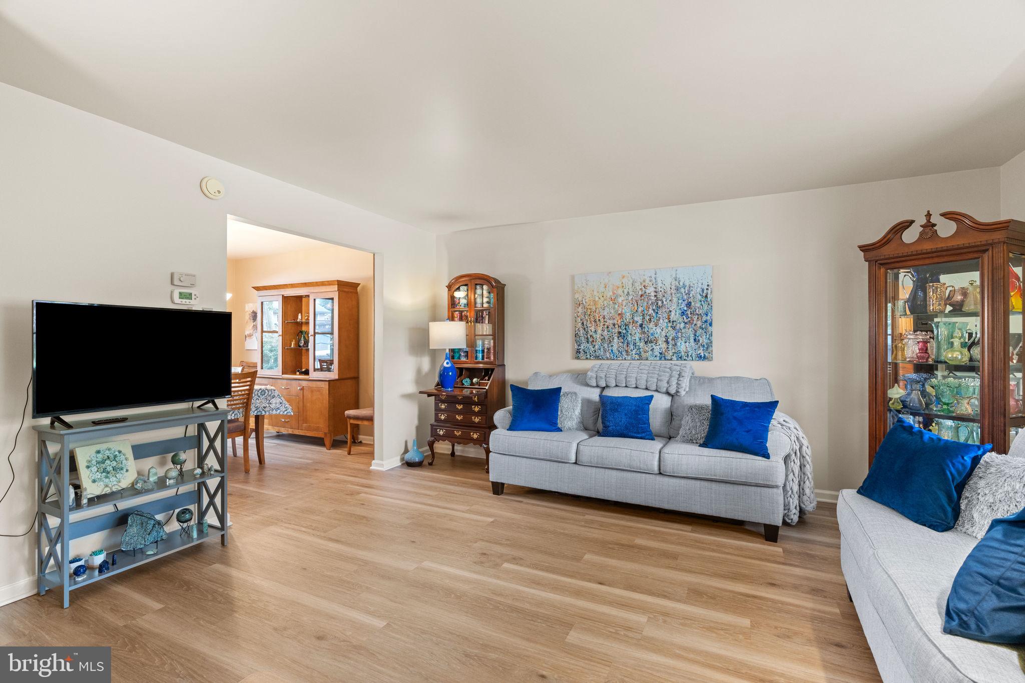 1036 Boeshore Circle Reading, PA 19605 - Photo 6 of 52 a living room with furniture and a flat screen tv