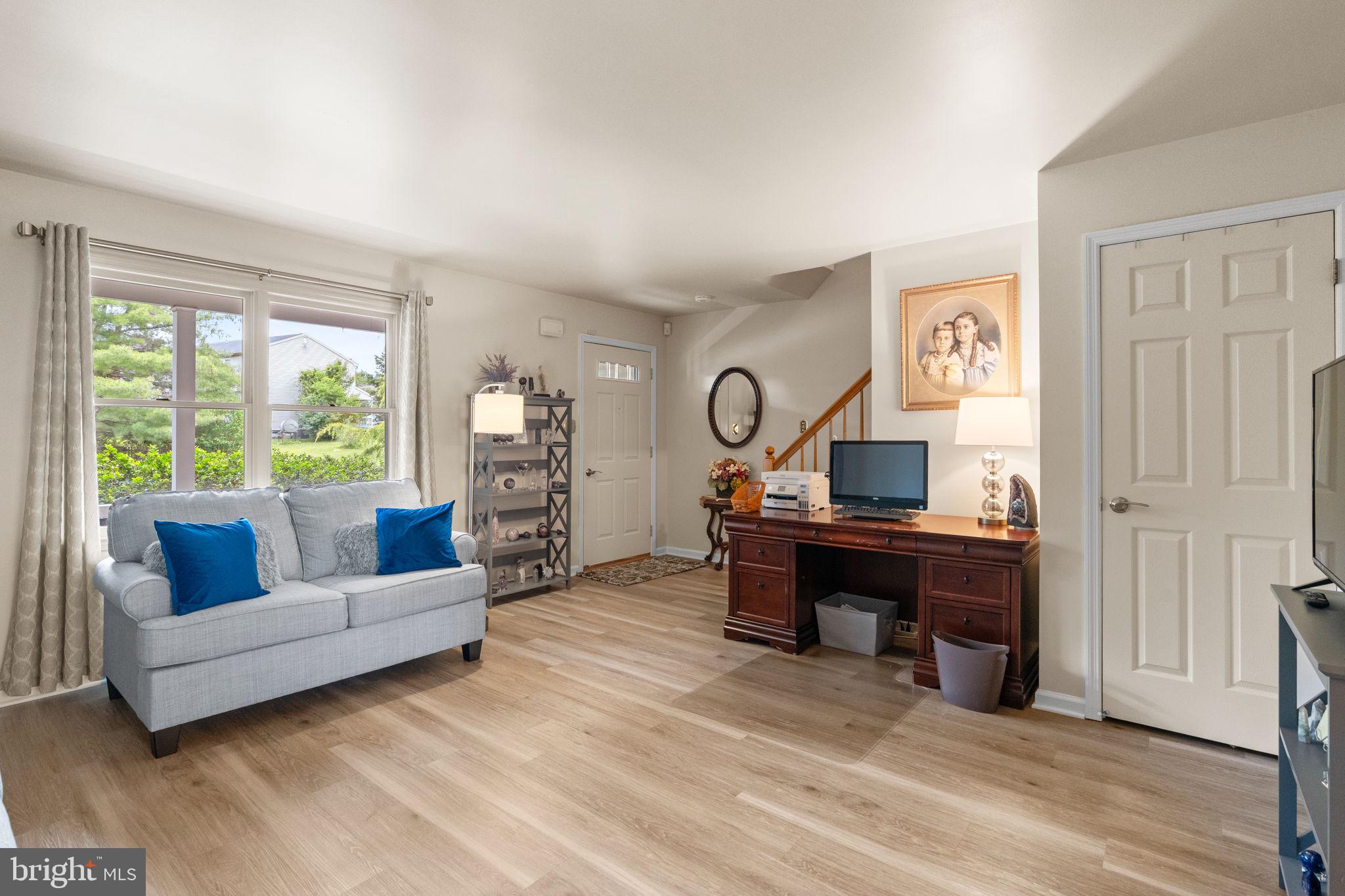 1036 Boeshore Circle Reading, PA 19605 - Photo 8 of 52 a living room with furniture or couch and a window