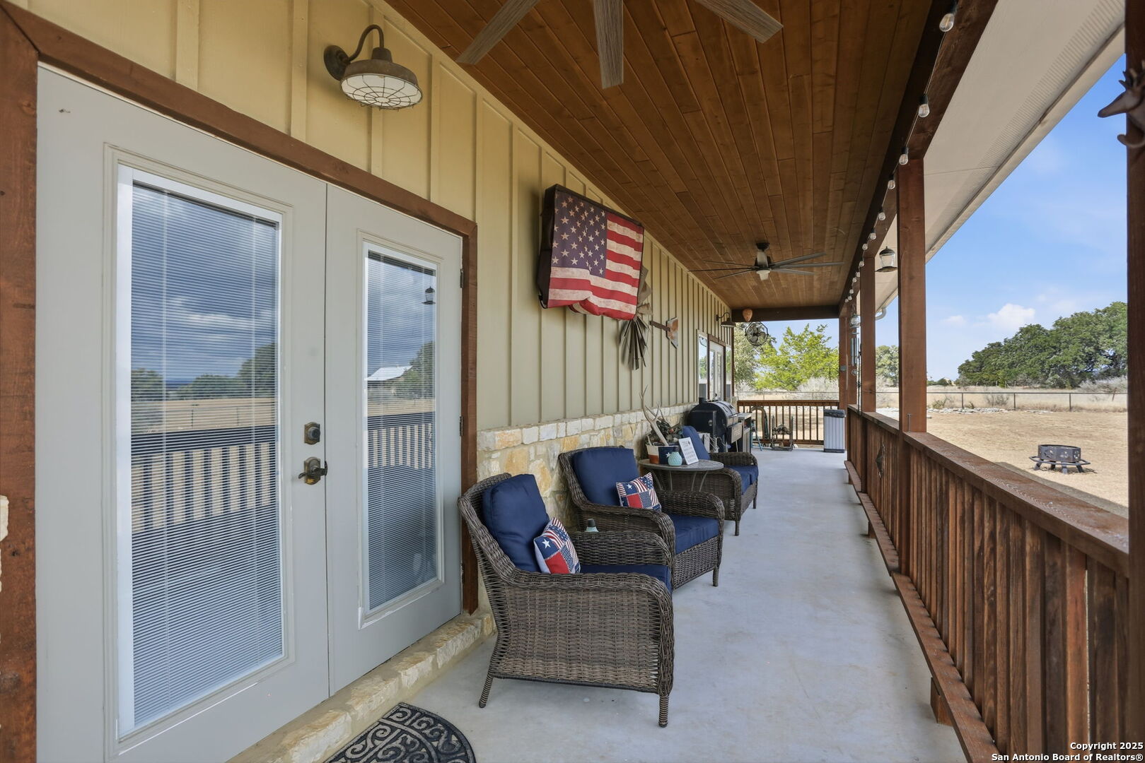 116 Martingale Trail Bandera, TX 78003 - Photo 23 of 40 a balcony with furniture and wooden floor