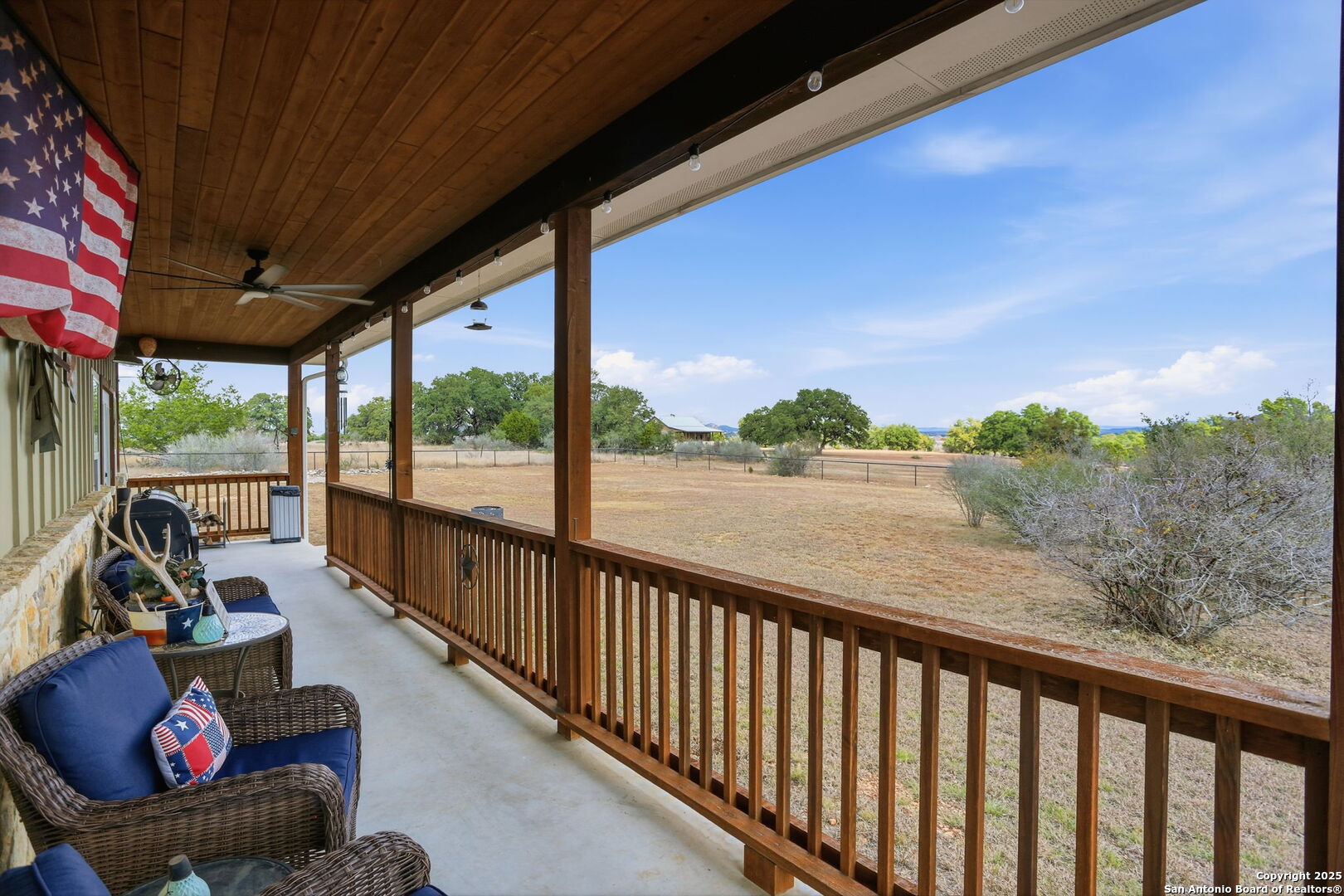 116 Martingale Trail Bandera, TX 78003 - Photo 24 of 40 a view of a two chairs in the balcony