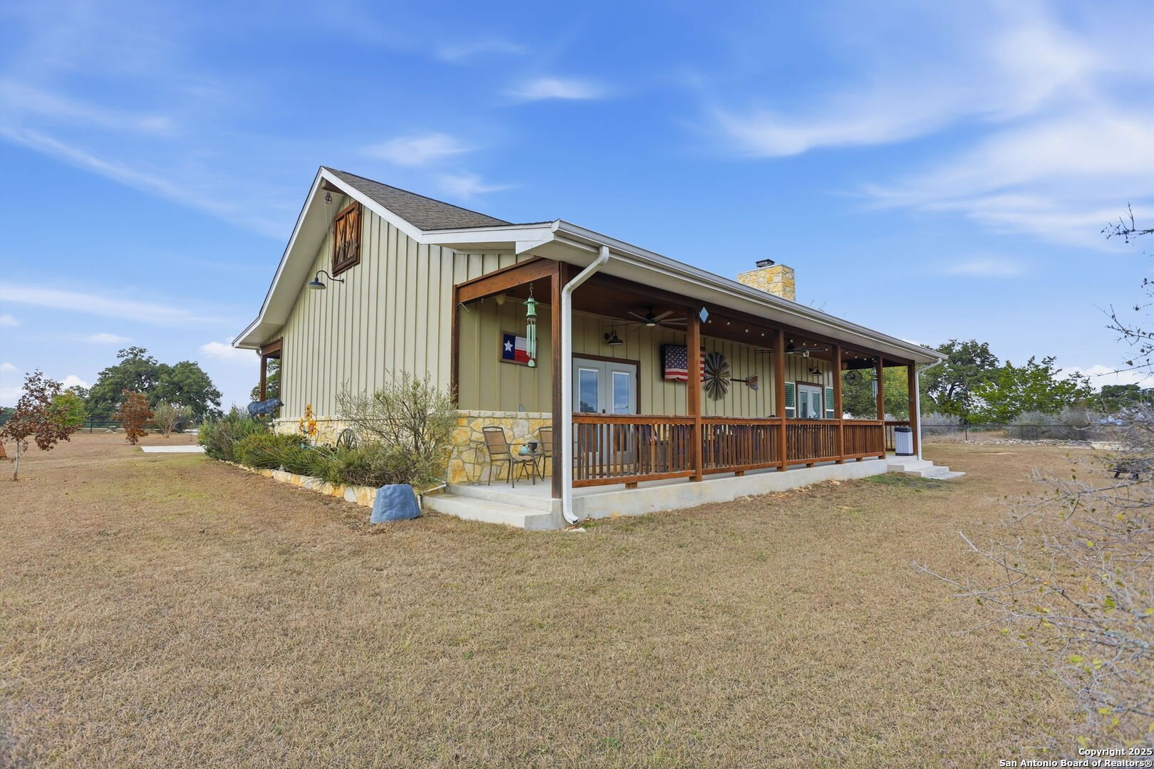 116 Martingale Trail Bandera, TX 78003 - Photo 25 of 40 a view of a house with porch and garden