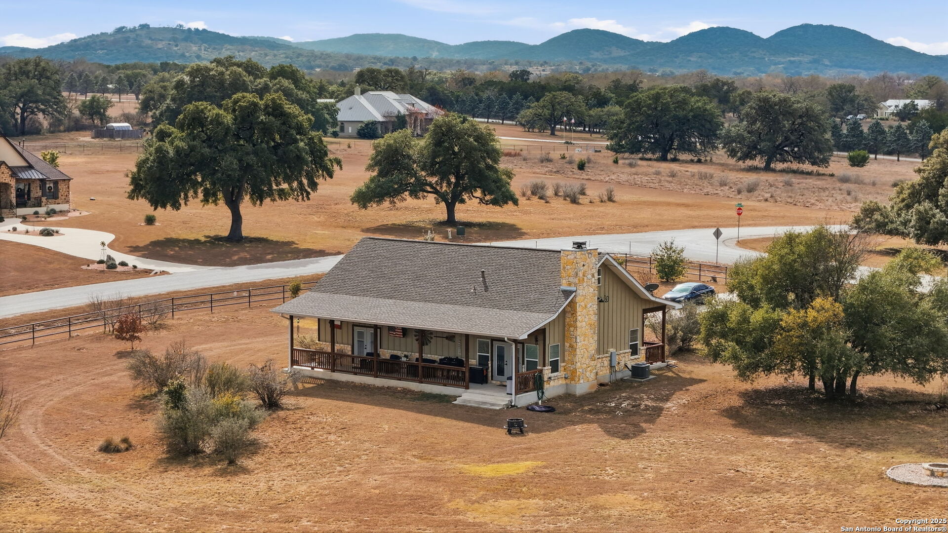 116 Martingale Trail Bandera, TX 78003 - Photo 27 of 40 a view of a town with mountains in the background
