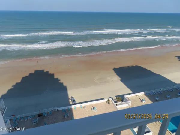 a view of a balcony with city view