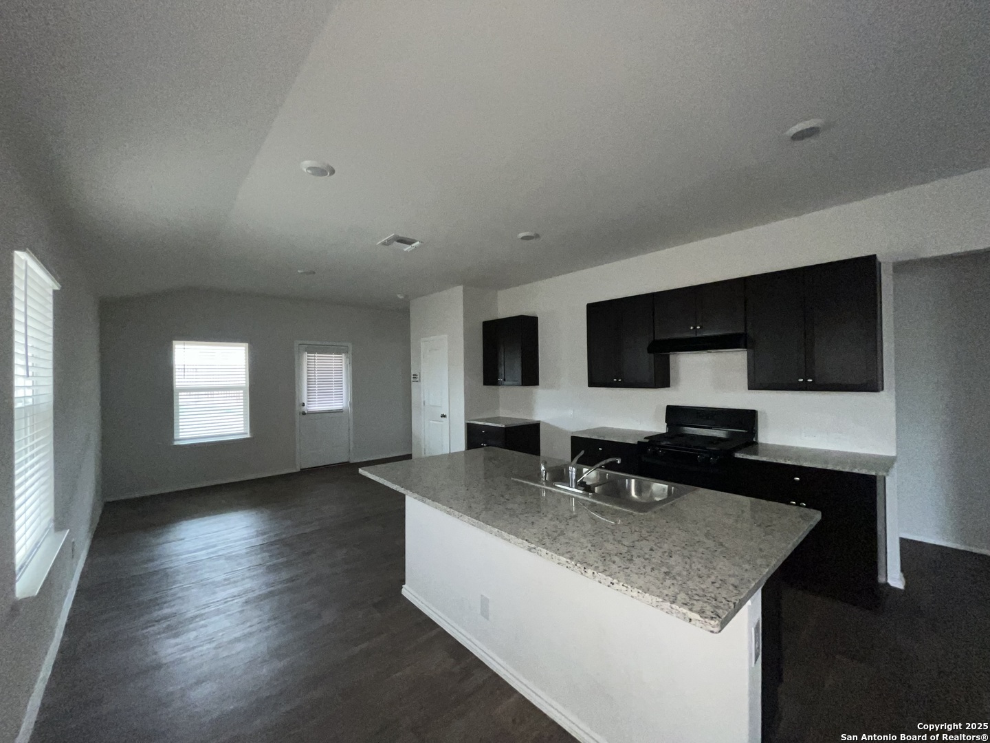 324 Middle Green Loop Floresville, TX 78114 - Photo 6 of 30 a living room with furniture and wooden floor