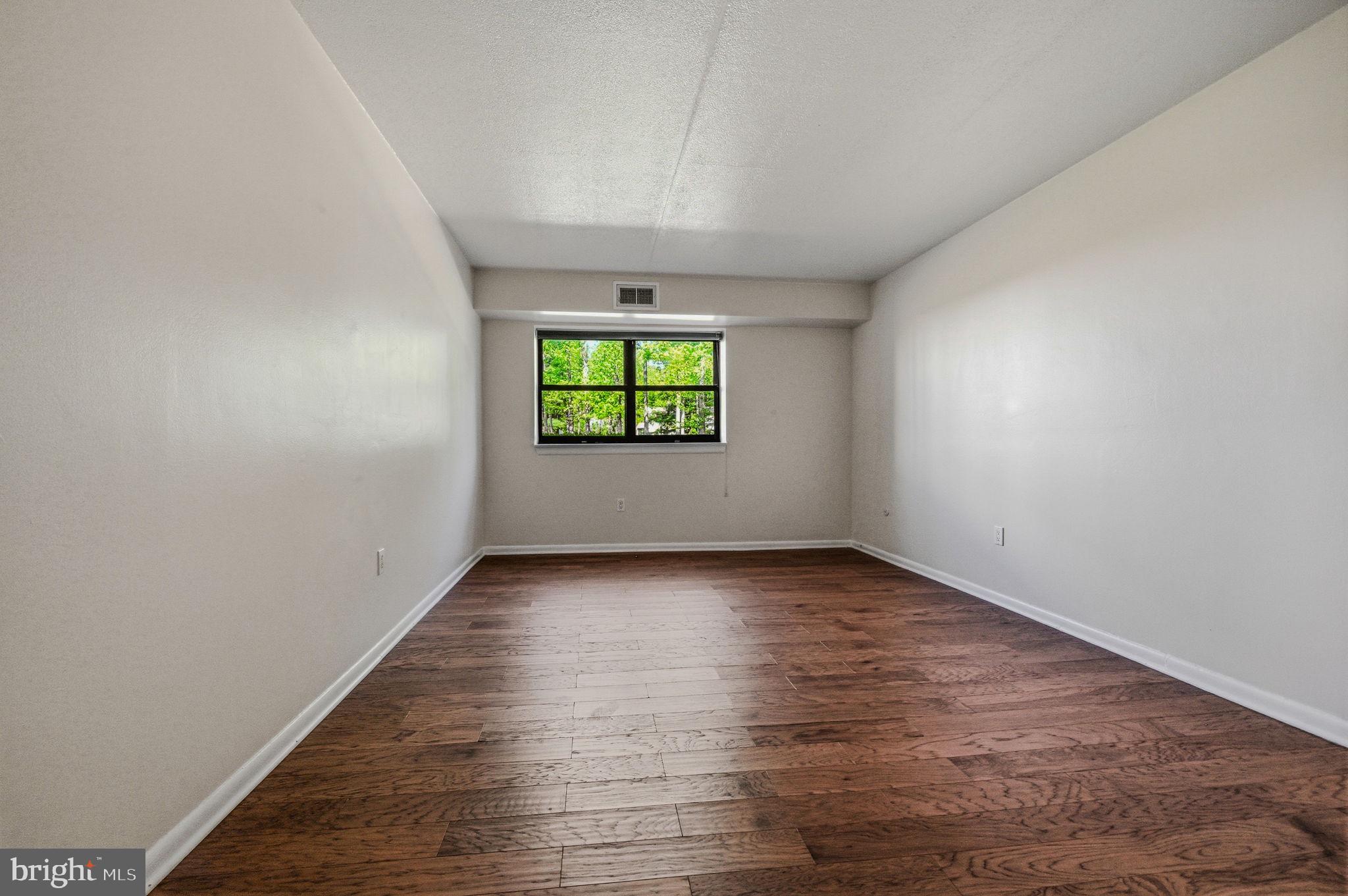 60 Welsh Tract Road, Unit 107 Newark, DE 19713 - Photo 17 of 24 an empty room with windows