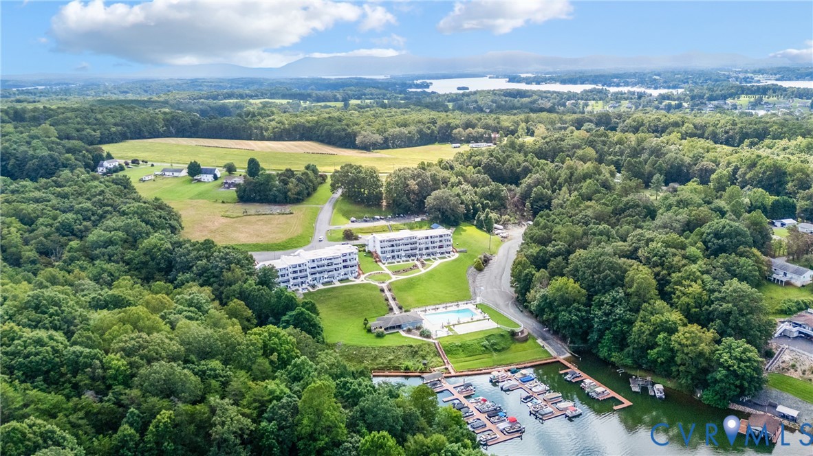 1085 Bluewater Drive, Unit 208 Moneta, VA 24121 - Photo 12 of 45 an aerial view of a house with a garden