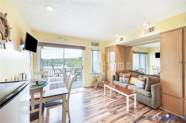 a living room with furniture and a table