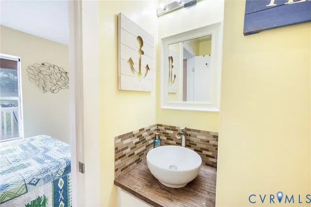 a view of a living room and floor to ceiling window