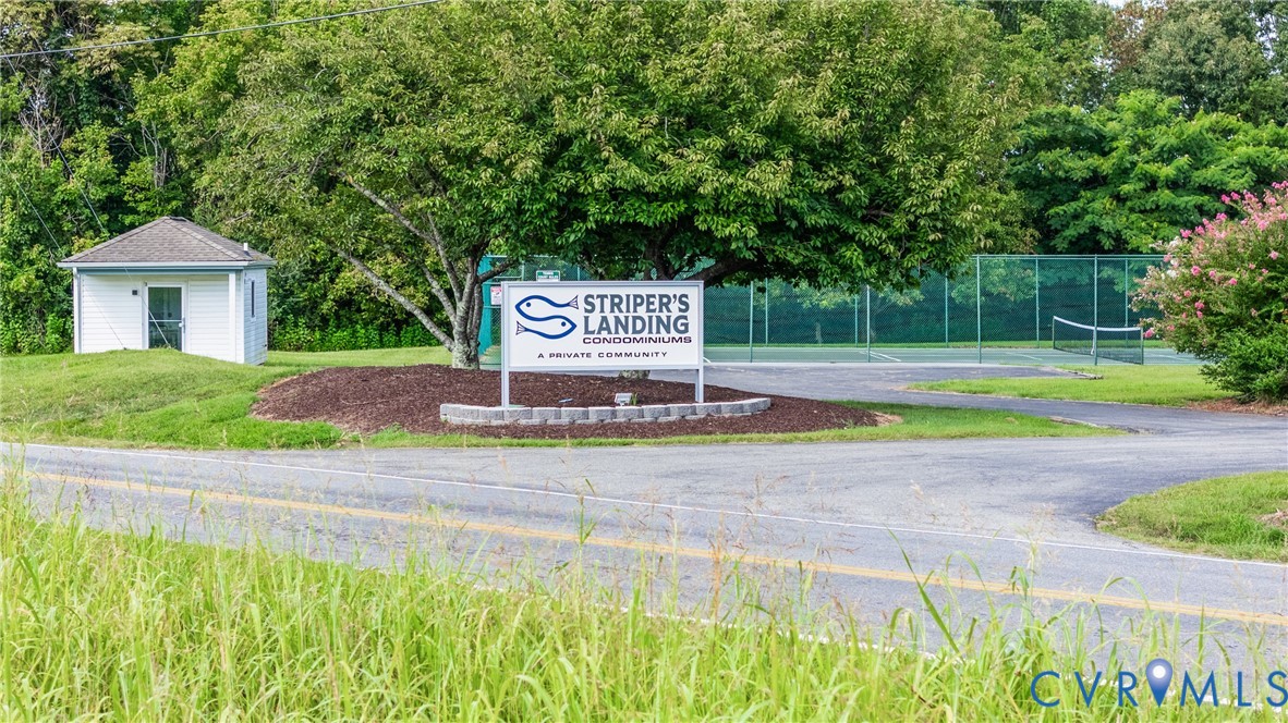 1085 Bluewater Drive, Unit 208 Moneta, VA 24121 - Photo 31 of 45 a sign that is on the side of a field