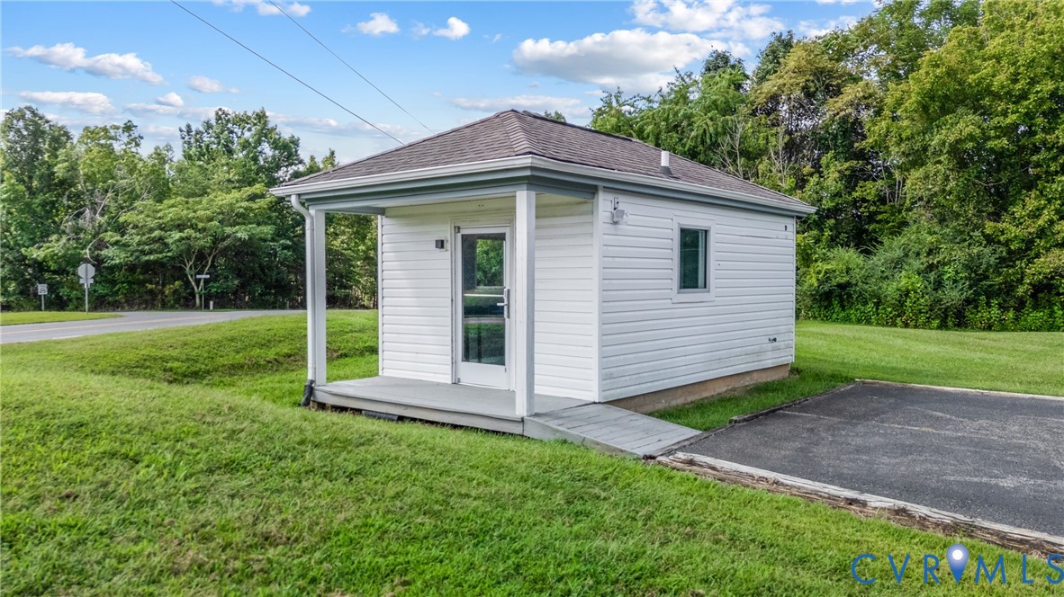1085 Bluewater Drive, Unit 208 Moneta, VA 24121 - Photo 32 of 45 a view of a house with backyard