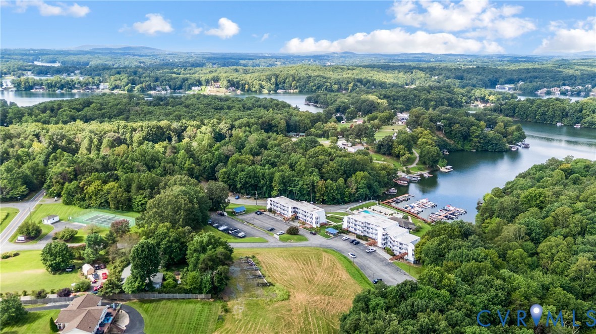 1085 Bluewater Drive, Unit 208 Moneta, VA 24121 - Photo 42 of 45 an aerial view of residential houses with outdoor space and lake view