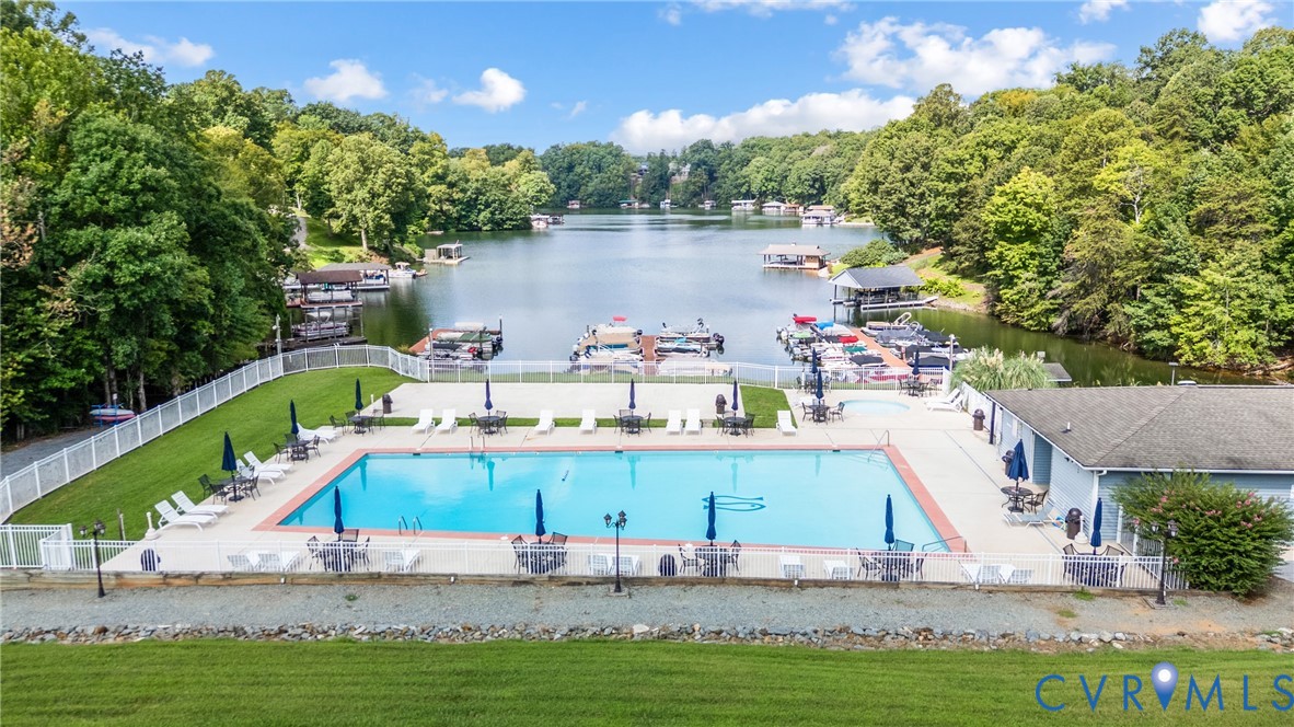 1085 Bluewater Drive, Unit 208 Moneta, VA 24121 - Photo 5 of 45 a view of a lake with a house