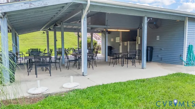an aerial view of a house with a garden
