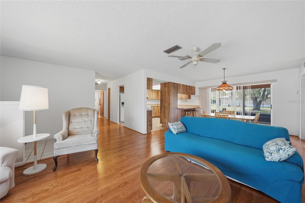 23035 Rye Avenue Punta Gorda, FL 33980 - Photo 4 of 20 a living room with furniture and wooden floor