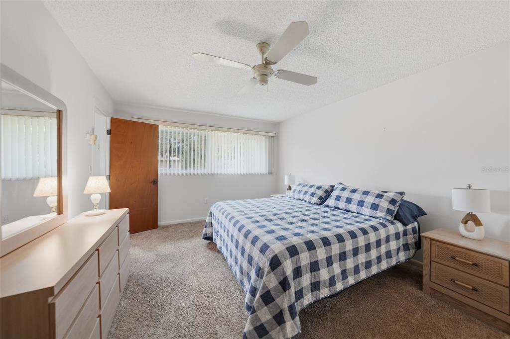 23035 Rye Avenue Punta Gorda, FL 33980 - Photo 10 of 20 a bedroom with a bed and furniture