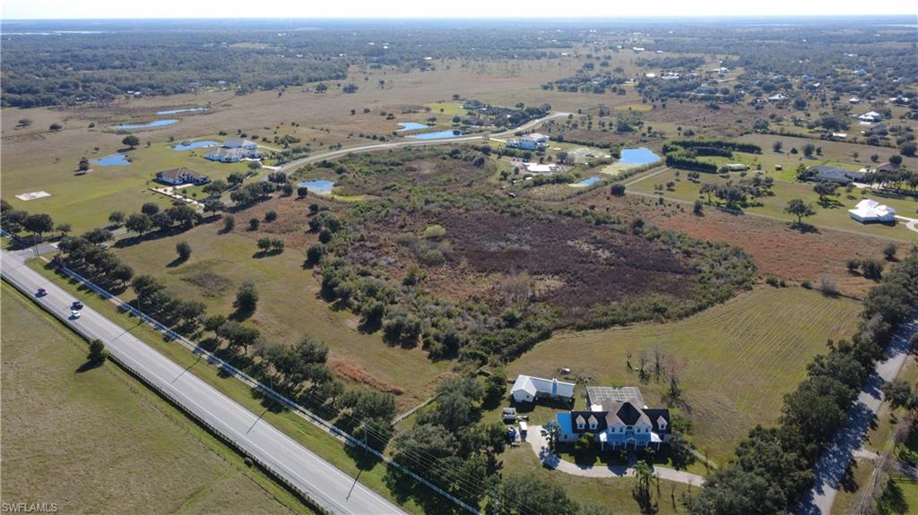 230 Cassata Road Sarasota, FL 34240 - Photo 2 of 9 an aerial view of residential houses with outdoor space
