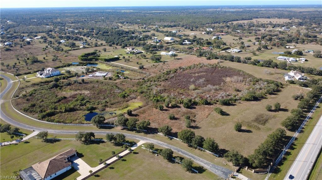 230 Cassata Road Sarasota, FL 34240 - Photo 4 of 9 an aerial view of a house with a yard