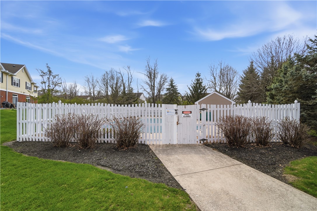 4294 Straight Arrow Road Dayton, OH 45430 - Photo 39 of 41 This outdoor pool area offers a refreshing escape with its crisp white fencing.