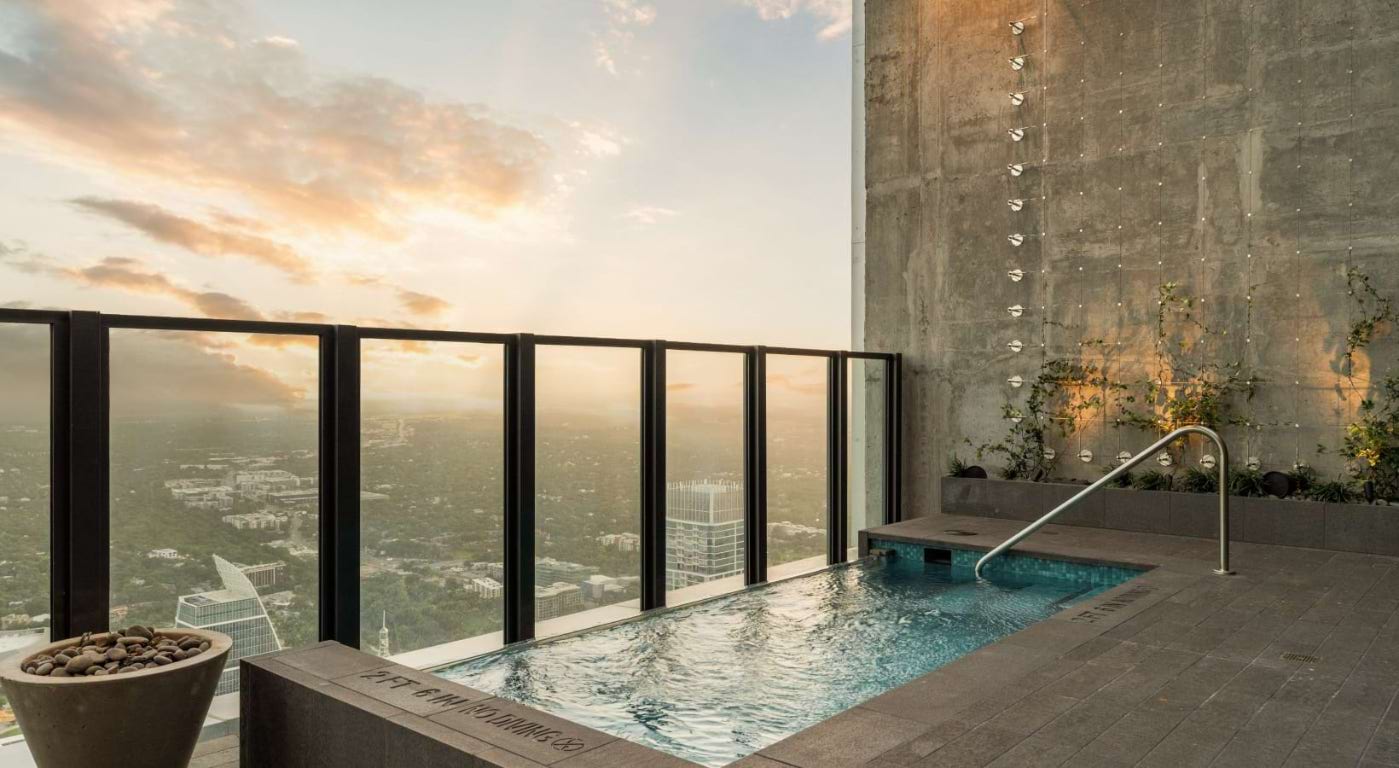 600 Guadalupe Street, Unit 5807 Austin, TX 78701 - Photo 20 of 28 a living room with a floor to ceiling window and furniture