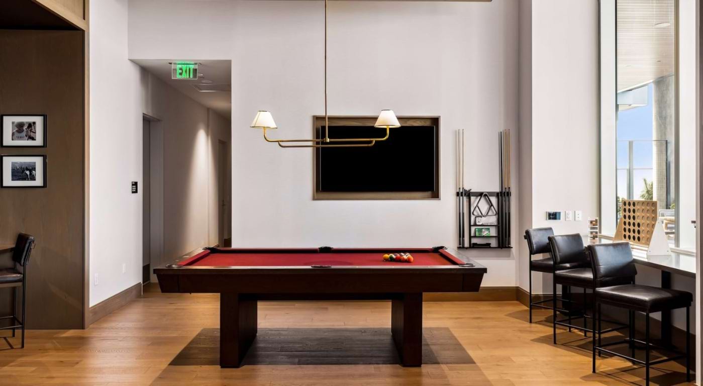 600 Guadalupe Street, Unit 5807 Austin, TX 78701 - Photo 24 of 28 a living room with furniture and a flat screen tv