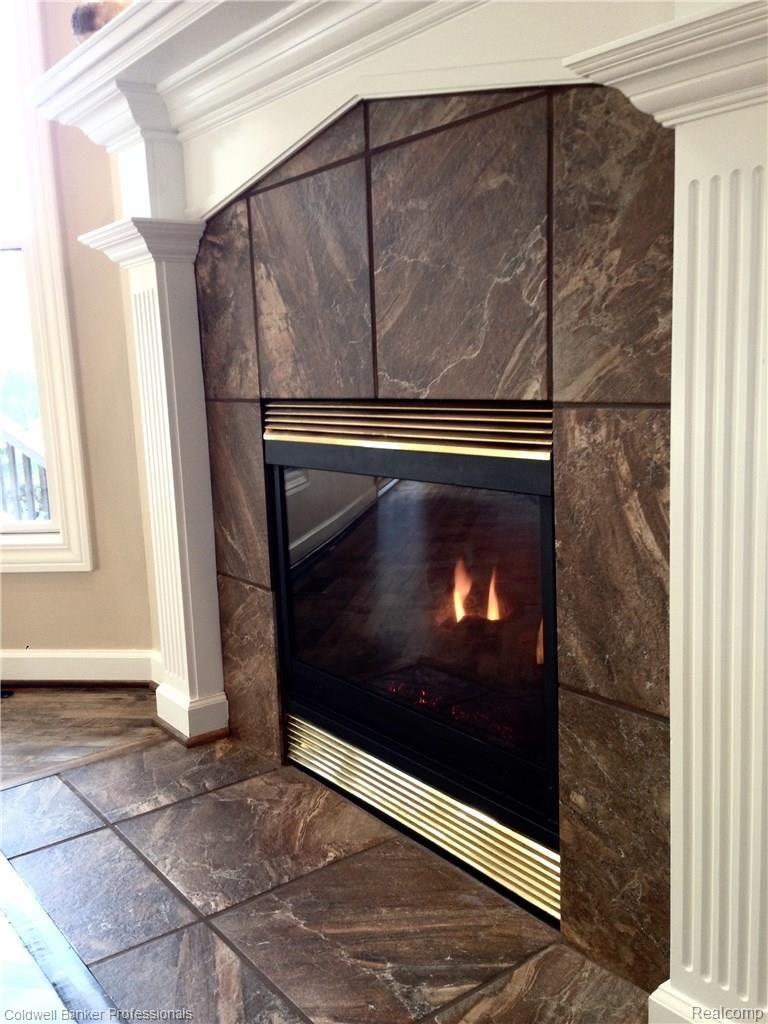 4723 Oakhurst Ridge Road, Unit 223 Clarkston, MI 48348 - Photo 7 of 21 Great Room Fireplace