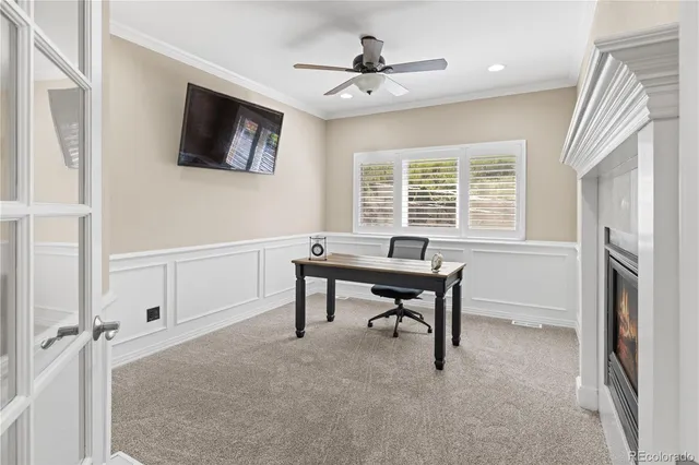a view of a livingroom with furniture and a window
