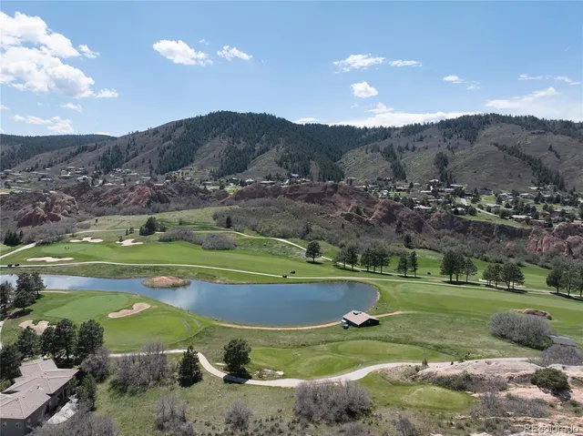 a view of a house with a big yard