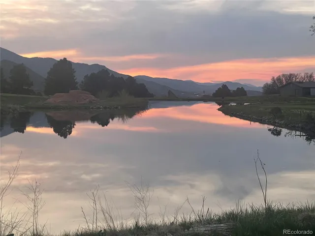 a view of lake with mountain