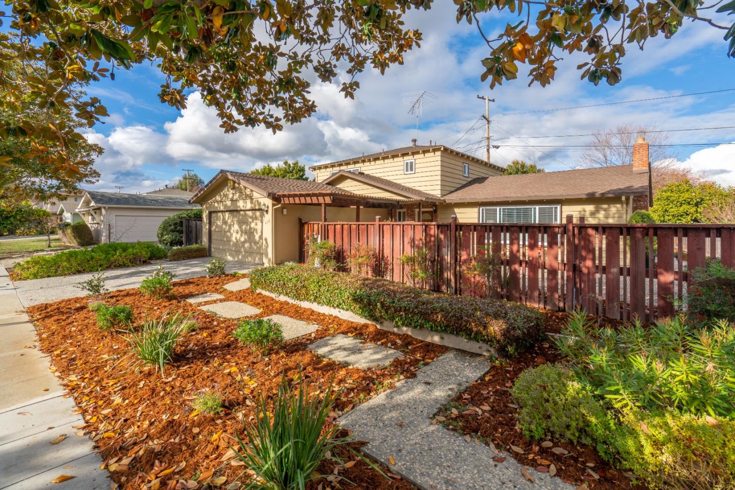 a view of a house with garden