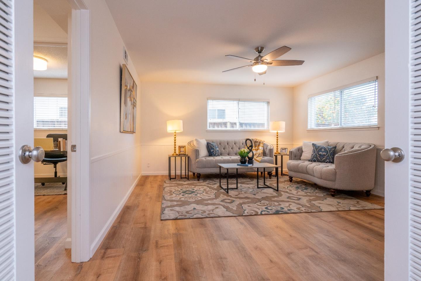 753 Peekskill Drive Sunnyvale, CA 94087 - Photo 18 of 33 a living room with furniture and a couch