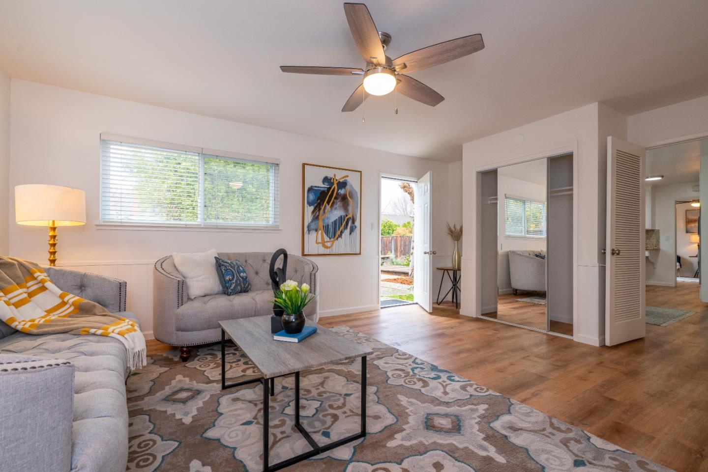 753 Peekskill Drive Sunnyvale, CA 94087 - Photo 20 of 33 a living room with furniture and a table