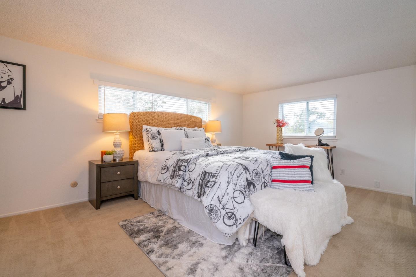 753 Peekskill Drive Sunnyvale, CA 94087 - Photo 22 of 33 a bed sitting in a bedroom next to a window with dresser