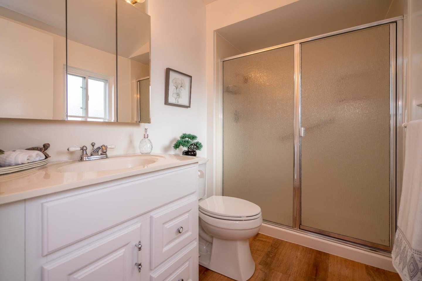 753 Peekskill Drive Sunnyvale, CA 94087 - Photo 23 of 33 a bathroom with a granite countertop sink toilet and shower