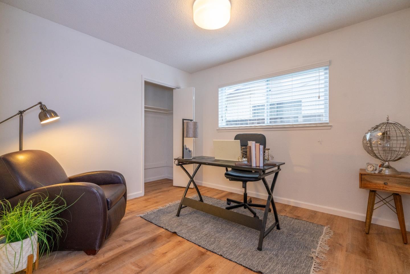 753 Peekskill Drive Sunnyvale, CA 94087 - Photo 24 of 33 a workspace with furniture and wooden floor