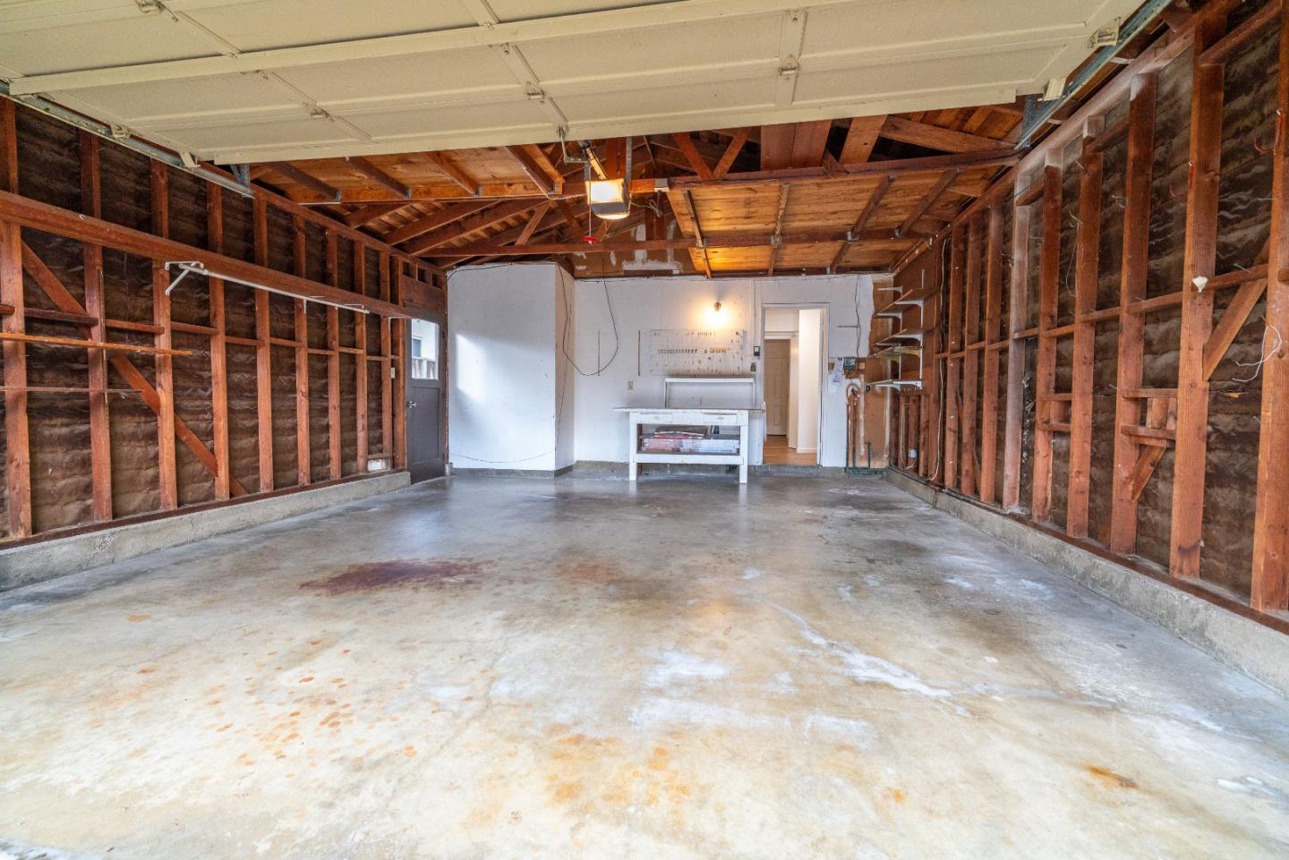 753 Peekskill Drive Sunnyvale, CA 94087 - Photo 30 of 33 a view of an empty room with wooden walls