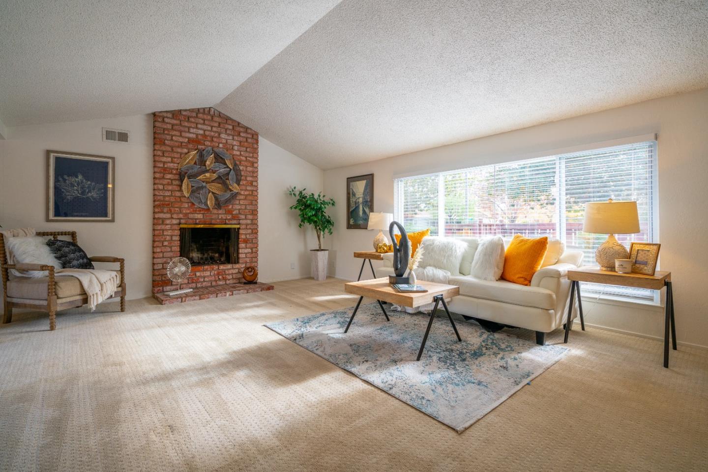 753 Peekskill Drive Sunnyvale, CA 94087 - Photo 8 of 33 a living room with furniture and a fireplace