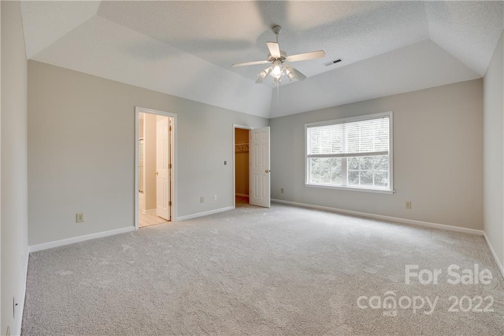 1307 Crown Ridge Drive Fort Mill, SC 29708 - Photo 15 of 24 an empty room with windows and fan